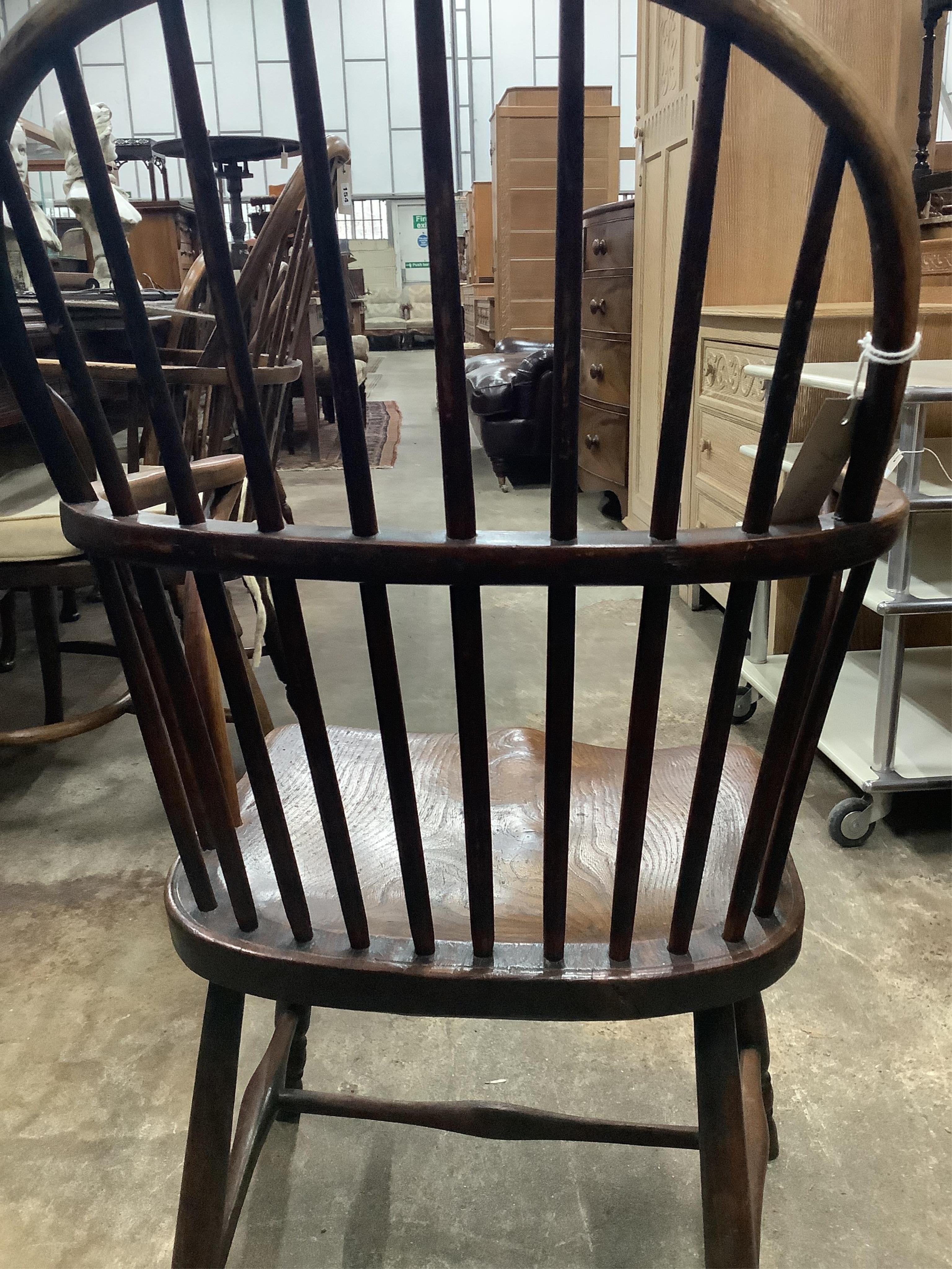 A 19th century Thames Valley elm and beech comb back Windsor elbow chair, width 49cm, depth 41cm, height 93cm. Condition - fair